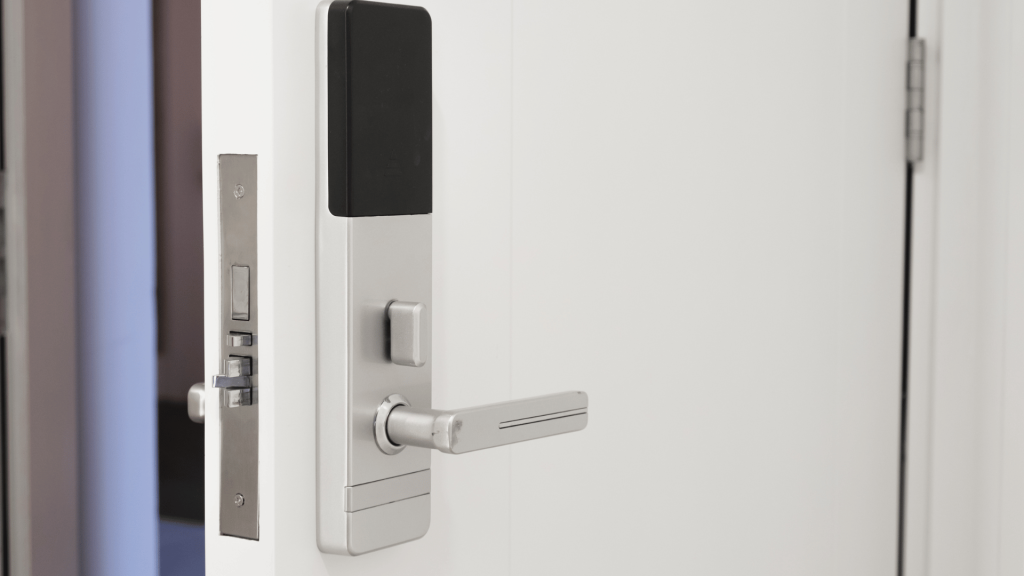 open door with access card reader on doorknob