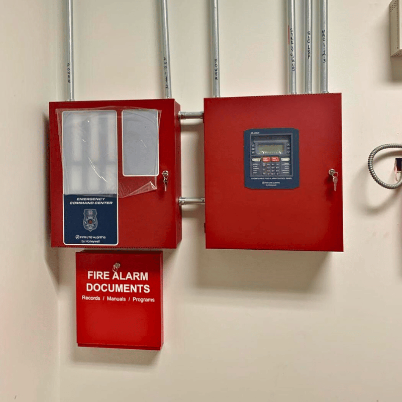 fire alarm installation by 2m technology with a control panel and safe for fire alarm documents