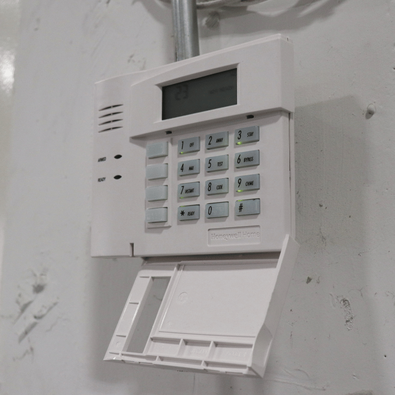 burglar alarm keypad on wall installed by 2m technology