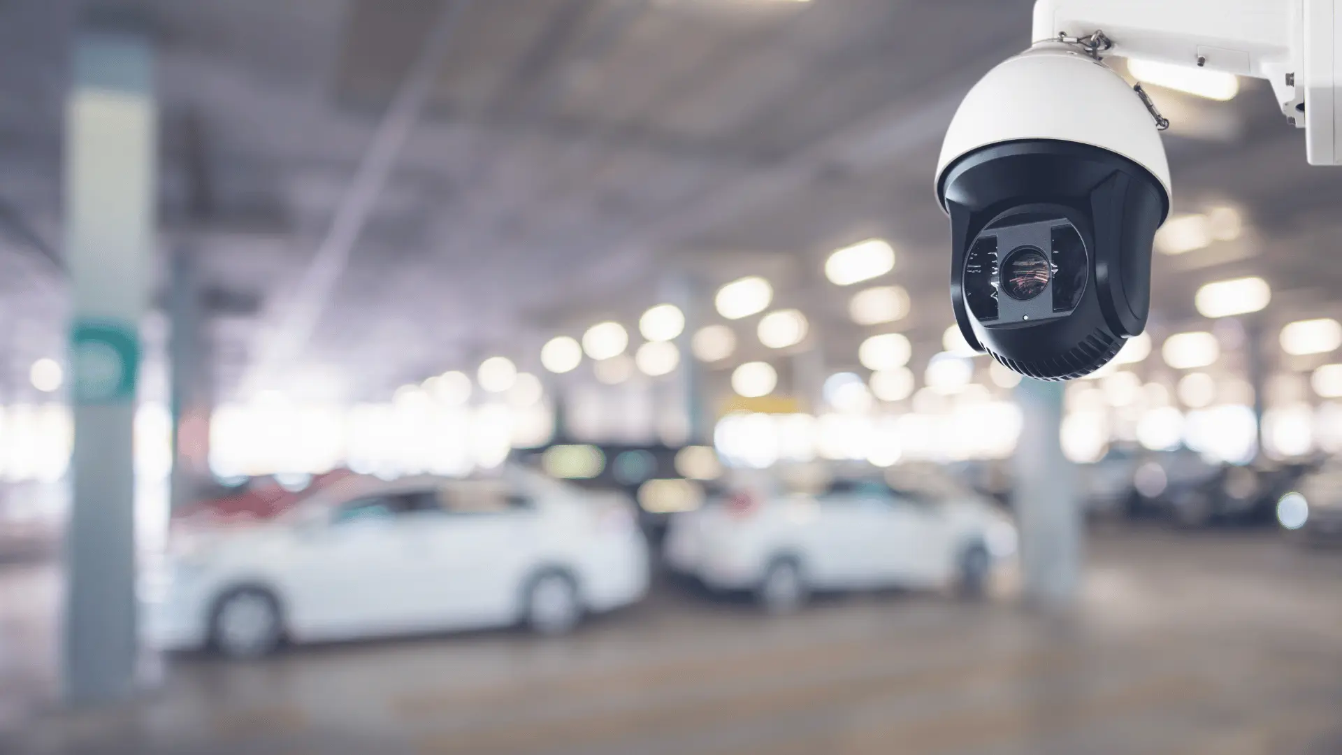 PTZ camera monitoring vehicles in a parking garage