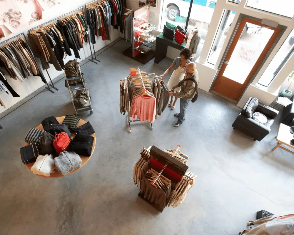 Customers walking around a clothing boutique