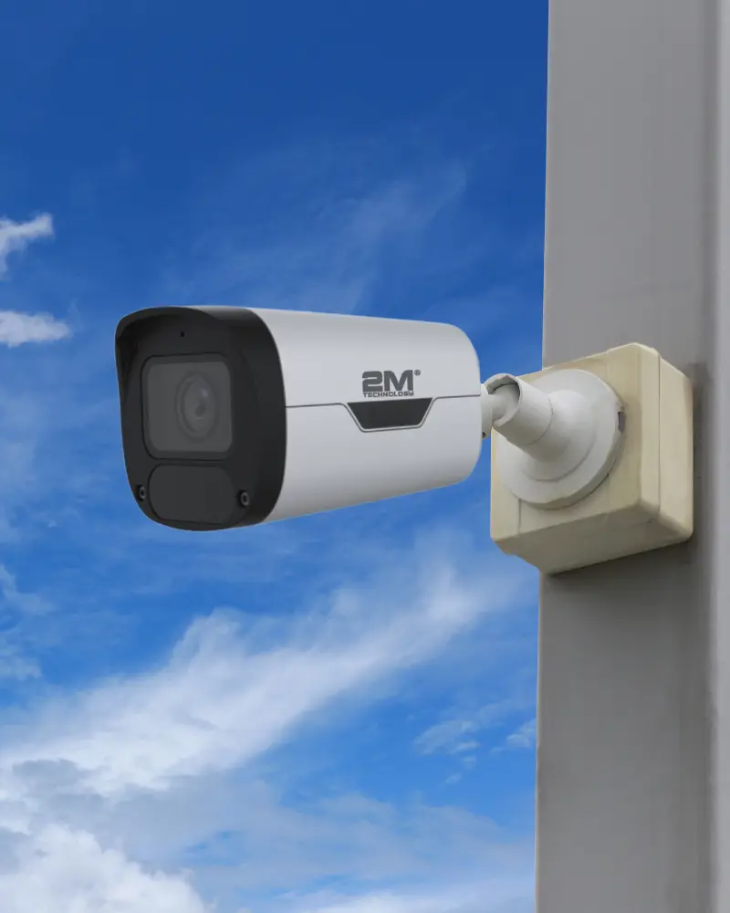 2M Technology bullet camera mounted on outdoor pole with clouds in the background